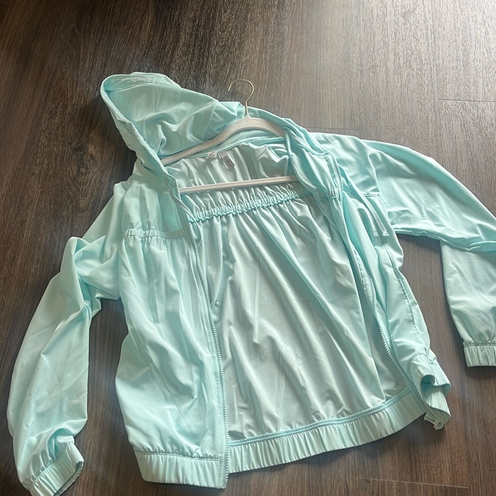 Light weight hoodie jacket. Like new, sky blue